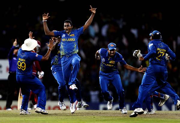 COLOMBO, SRI LANKA - OCTOBER 7: Sri Lankan player Ajantha Mendis celebrates the dismissal of West Indies player Chris Gayle during the ICC World T20 Final between Sri Lanka and West Indies at R. Premadasa Stadium on October 7, 2012 in Colombo, Sri Lanka. (Photo by Ajay Aggarwal/Hindustan Times via Getty Images)