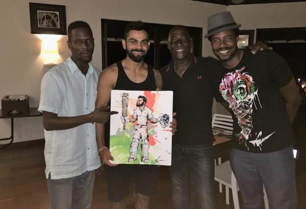 Virat Kohli with the painting he received from Mali Richards, son of Sir Viv Richards
