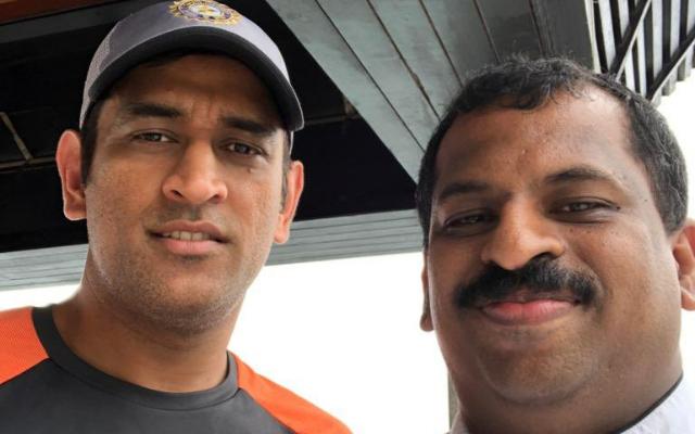 MS Dhoni with a fan