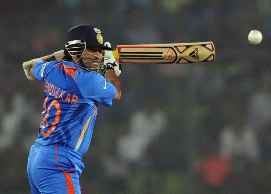 Sachin Tendulkar plays a late cut shot for a four . (Photo Source : AFP)