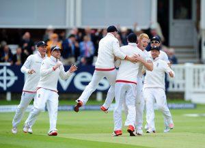Ben Stokes of England celebrates with his team mates after bowling Brendon McCullum