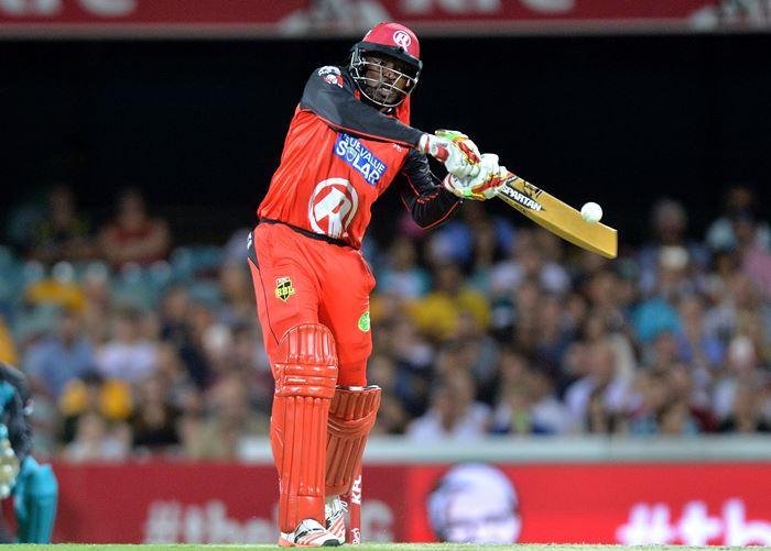 BRISBANE, AUSTRALIA - DECEMBER 19: Chris Gayle of the Renegades hits the ball over the boundary for a six during the Big Bash League match between the Brisbane Heat and the Melbourne Renegades at The Gabba on December 19, 2015 in Brisbane, Australia. (Photo by Bradley Kanaris/Getty Images)