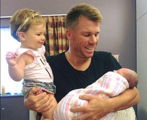David Warner with his two Daughters