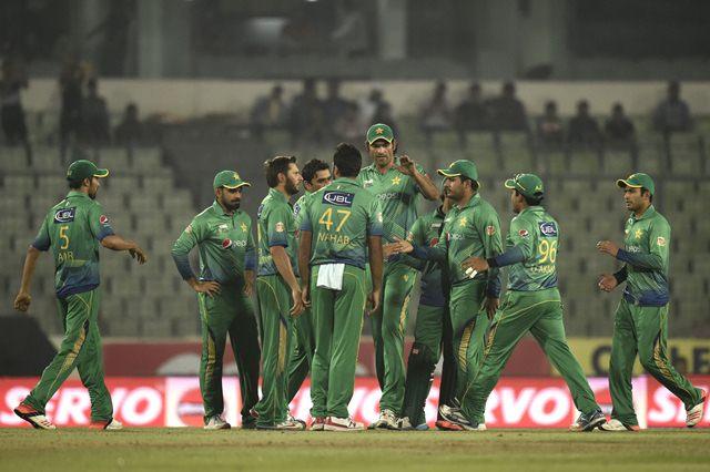 Pakistan cricketers celebrate after the dismissal