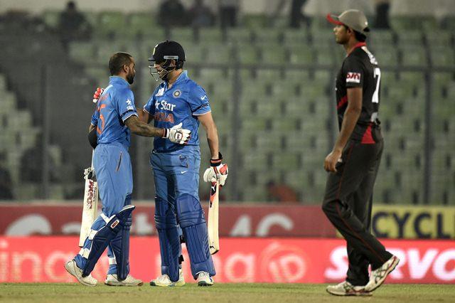 Yuvraj Singh celebrates the team victory with Shikhar Dhawan India