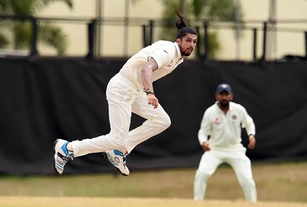 Indian cricketer Ishant Sharma delivers a ball during the second day of a two-day tour match between India and WICB President's XI squad at the Warner Park stadium in Basseterre, Saint Kitts, on July 10, 2016. / AFP / Jewel SAMAD (Photo credit should read JEWEL SAMAD/AFP/Getty Images)