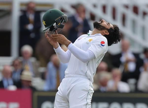 Pakistan's Misbah-Ul-Haq celebrates his century on the first day of the first Test cricket match between England and Pakistan at Lord's cricket ground in London, on July 14, 2016. / AFP / Lee MILLS / RESTRICTED TO EDITORIAL USE. NO ASSOCIATION WITH DIRECT COMPETITOR OF SPONSOR, PARTNER, OR SUPPLIER OF THE ECB (Photo credit should read LEE MILLS/AFP/Getty Images)