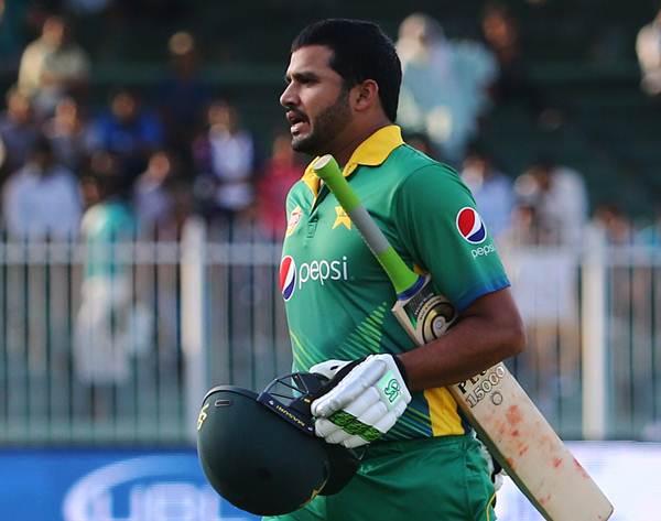 Pakistan's Azhar Ali walks out of the pitch after he was dismissed during the third One Day International (ODI) match between Pakistan and England at The Sharjah Cricket Stadium in the Gulf Emirate of Sharjah on November 17, 2015. AFP PHOTO / MARWAN NAAMANI (Photo credit should read MARWAN NAAMANI/AFP/Getty Images)