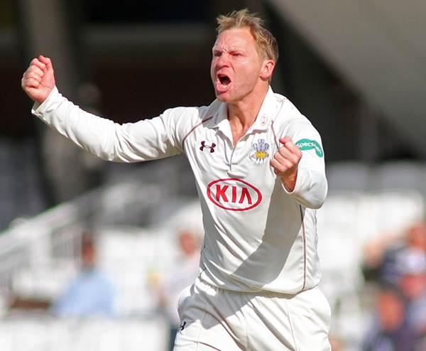 Gareth Batty of Surrey celebrates taking the wicket of John Simpson of Middlesex during the Specsavers County Championship Division One match between Surrey and Middlesex at the Kia Oval Cricket Ground, on May 15, 2016 in London, England.