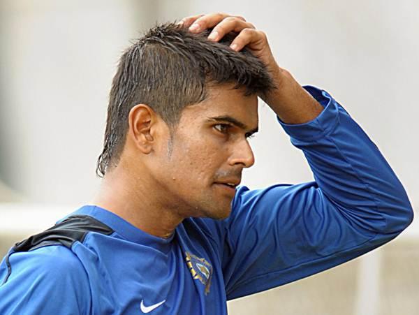 Indian cricketer S. Badrinath gestures as he attends a camp at the National Cricket Academy (NCA) in Bangalore on July 14, 2009. The NCA organised a five-day preparatory camp organised for emerging players ahead of their tour of Australia