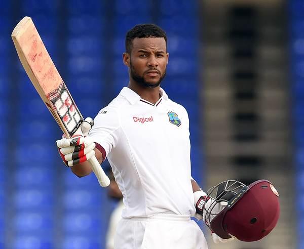 WICB President's XI squad batsman Shai Hope celebrates scoring his century during the second day of a two-day tour match between India and WICB President's XI squad at the Warner Park stadium in Basseterre, Saint Kitts, on July 10, 2016. / AFP / Jewel SAMAD (Photo credit should read JEWEL SAMAD/AFP/Getty Images)