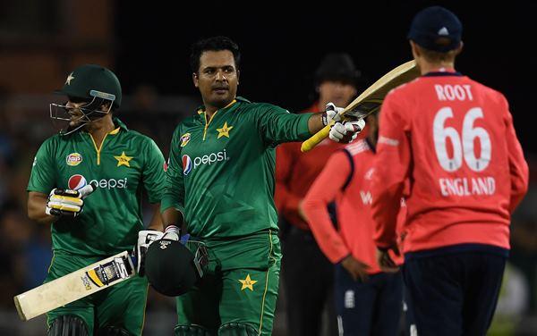 Pakistan's Sharjeel Khan (2L) celebrates his half-century during the T20 international cricket match between England and Pakistan at The Emirates Old Trafford, in Manchester, north-west England, on September 7, 2016. / AFP / PAUL ELLIS / RESTRICTED TO EDITORIAL USE. NO ASSOCIATION WITH DIRECT COMPETITOR OF SPONSOR, PARTNER, OR SUPPLIER OF THE ECB (Photo credit should read PAUL ELLIS/AFP/Getty Images)