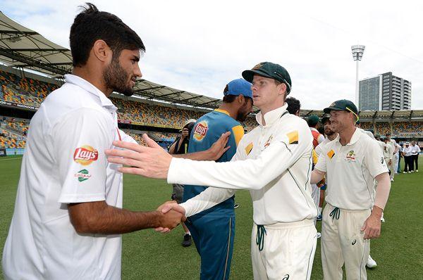 BRISBANE, AUSTRALIA - DECEMBER 19:  Steve Smith of Australia and team mates shake hands with the Pakistan team during day five of the First Test match between Australia and Pakistan at The Gabba on December 19, 2016 in Brisbane, Australia.  (Photo by Bradley Kanaris/Getty Images)