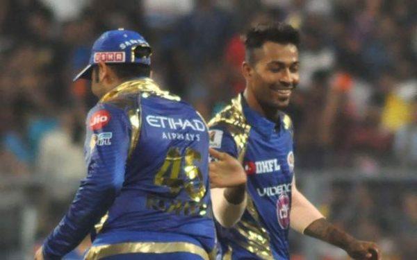 Mumbai Indians celebrate fall of a wicket