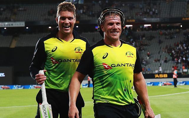 Alex Carey of Australia and Aaron Finch of Australia walk off after beating New Zealand