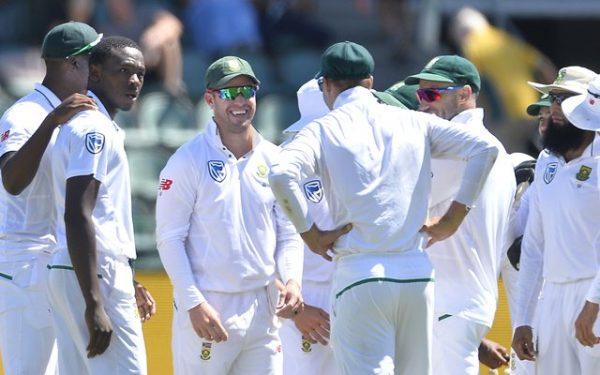 Kagiso Rabada and teammates of South Africa celebrate the wicket of David Warner