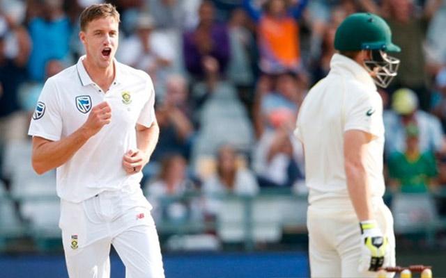 South African bowler Morne Morkel (L) celebrates the dismissal of Australian batsman Steven Smith