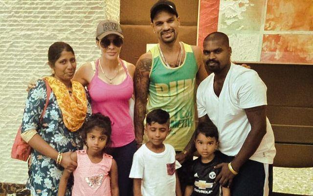 Shikhar Dhawan's family with his die-hard fan's family
