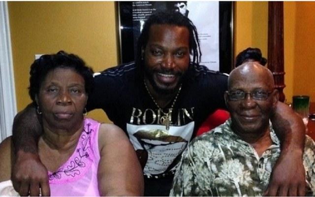 Chris Gayle with his mother and father