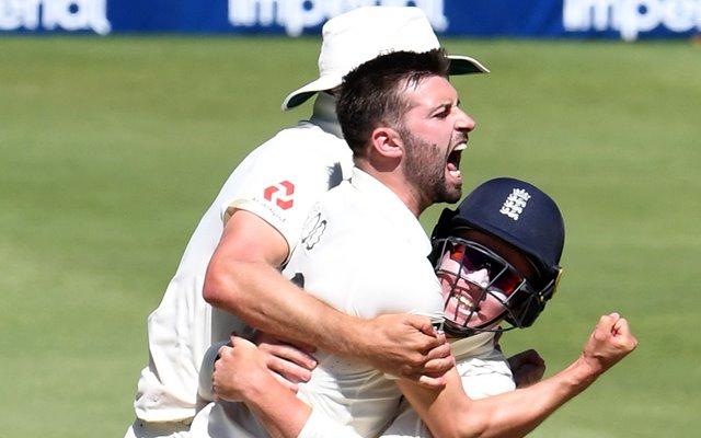 Mark Wood and Ollie Pope of England celebrate