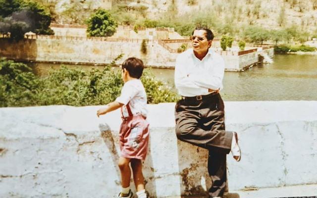 Virat Kohli with his father