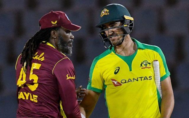 Chris Gayle and Mitchell Starc