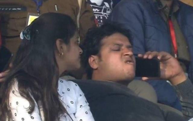 A cricket fan watching India vs New Zealand match